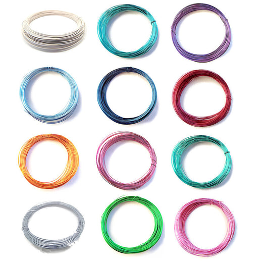 Assorted colorful wires arranged in a grid on a white background