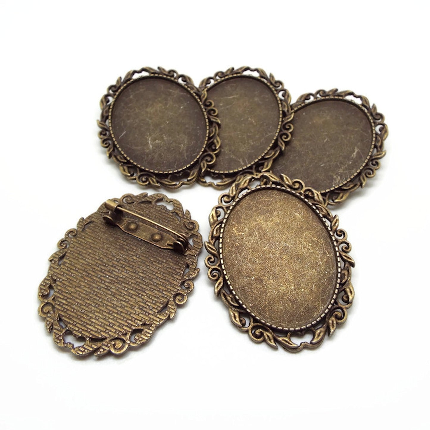 5 Bronze Brooch Blanks with Leaf Design Edging and 30x40mm Setting