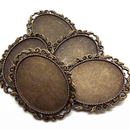 5 Bronze Brooch Blanks with Leaf Design Edging and 30x40mm Setting